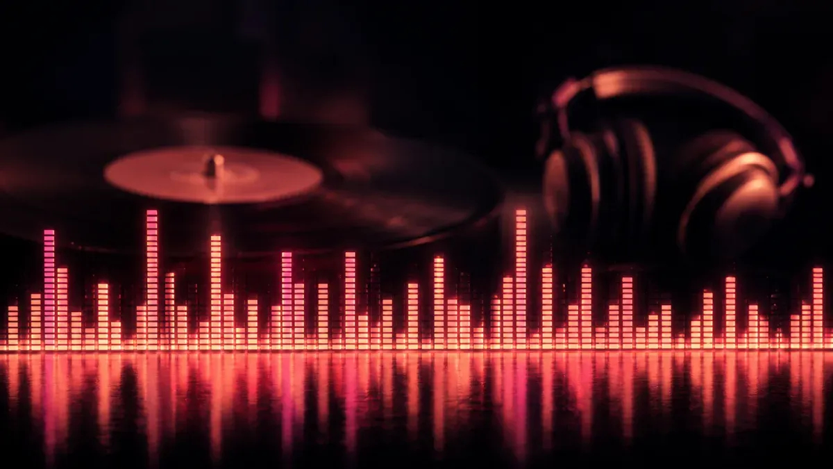 Glowing magenta spectrum bars rising from the bottom of a dark frame with a vinyl record and studio headphones silhouetted behind them